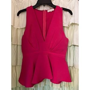 Gorgeous pink peplum, perfect for the holiday season!